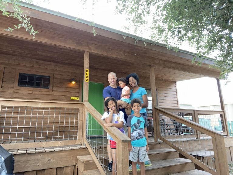 interracial family at a camping cabin koa kampground